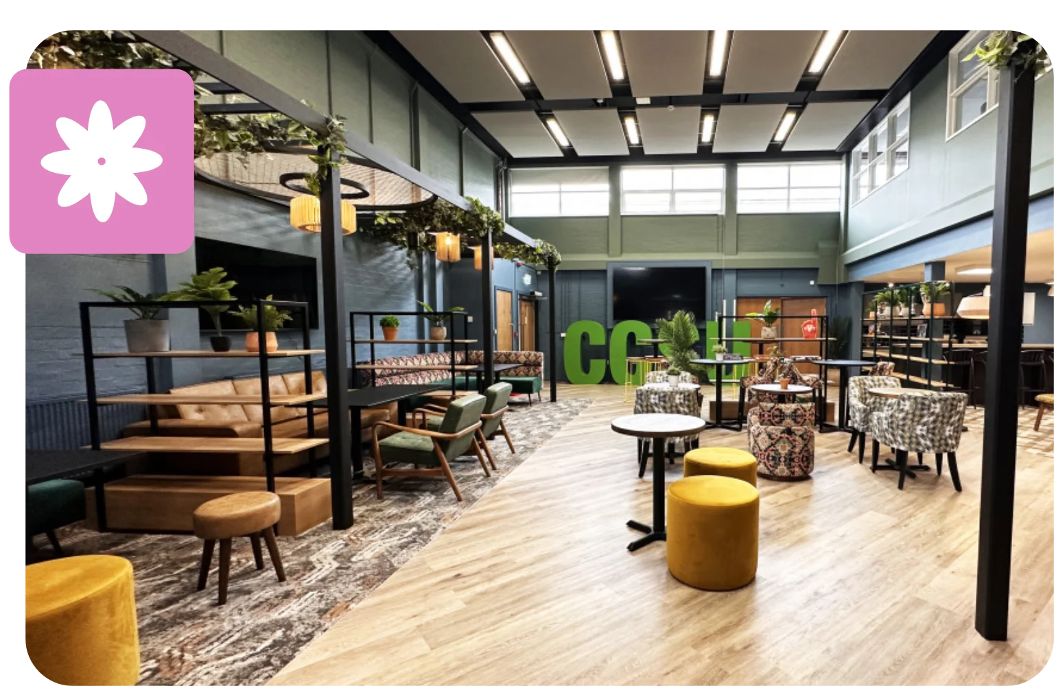 A modern indoor seating area with different types of chairs and tables.